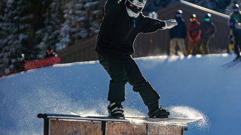 snowboarder on park feature