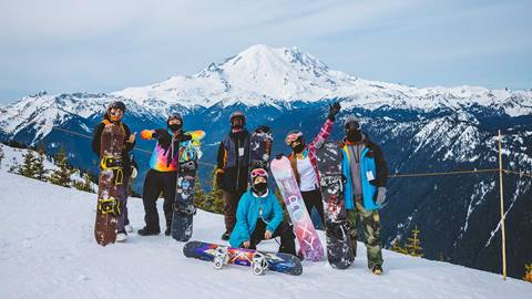 Skiers in front of Mt Rainier