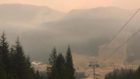 Wildfire smoke lingering over chairlift